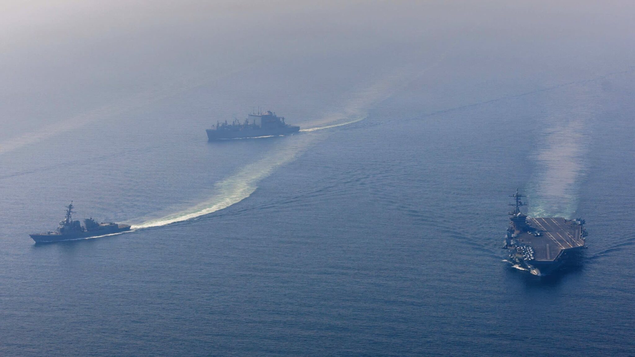 US warns Iran to make a deal as it steps up military deployments